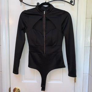 Black long sleeve open chest bodysuit.